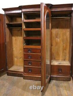 Antique Large Victorian mahogany breakfront combination triple door wardrobe