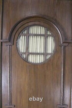 Antique good quality large Arts and crafts carved oak double door wardrobe