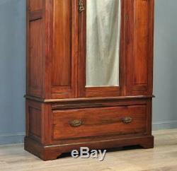 Attractive Large Antique Carved Walnut Mirror Door Wardrobe With Drawer Base