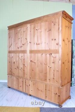 Delivery Options Large Antique Style Pine Wardrobe 4 Doors 2 Drawers Bun Feet