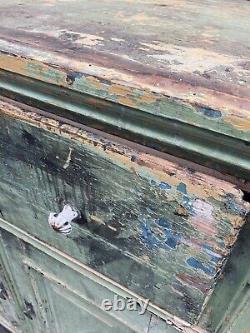 Green Continental cabinet with large drawer and colourful patina