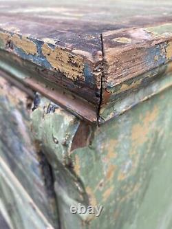 Green Continental cabinet with large drawer and colourful patina