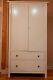 Large 2 door wardrobe with deep drawers. Sturdy. Cannot be disassembled