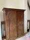 Large Victorian two-door wardrobe with internal hanging space, drawers & shelves