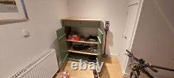 Large chest with top drawer and folding doors with shelves
