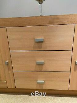 Large contemporary solid light oak sideboard with 2 door cupboards, 3 drawers
