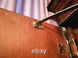 Large solid heavy duty wooden wardrobe. 4 big drawers. Brass fittings. Paid