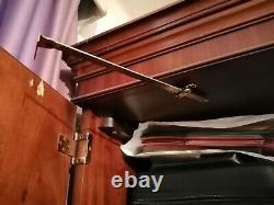 Large solid heavy duty wooden wardrobe. 4 big drawers. Brass fittings. Paid