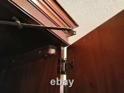 Large solid heavy duty wooden wardrobe. 4 big drawers. Brass fittings. Paid