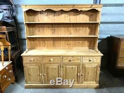 Large solid pine four door/drawer dresser sideboard with plate rack shelved top