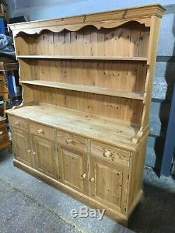 Large solid pine four door/drawer dresser sideboard with plate rack shelved top