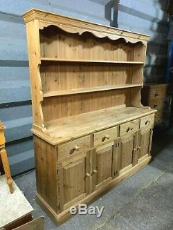 Large solid pine four door/drawer dresser sideboard with plate rack shelved top