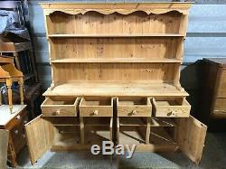 Large solid pine four door/drawer dresser sideboard with plate rack shelved top