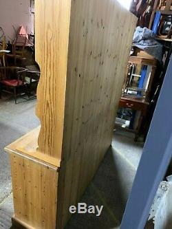 Large solid pine four door/drawer dresser sideboard with plate rack shelved top