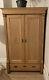 Large solid pine wardrobe with doors and drawer £350