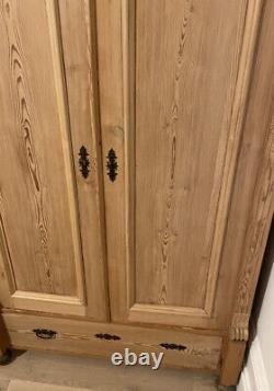 Large solid pine wardrobe with doors and drawer £350