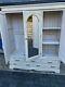 Large triple door wardrobe and drawers in off white in three sections