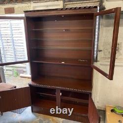 Large wooden display cabinet with glass doors, unbranded wooden