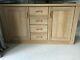 Used large solid wooden sideboard with 4 drawers and 2 doors from Glasswells