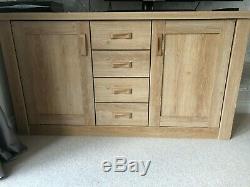 Used large solid wooden sideboard with 4 drawers and 2 doors from Glasswells